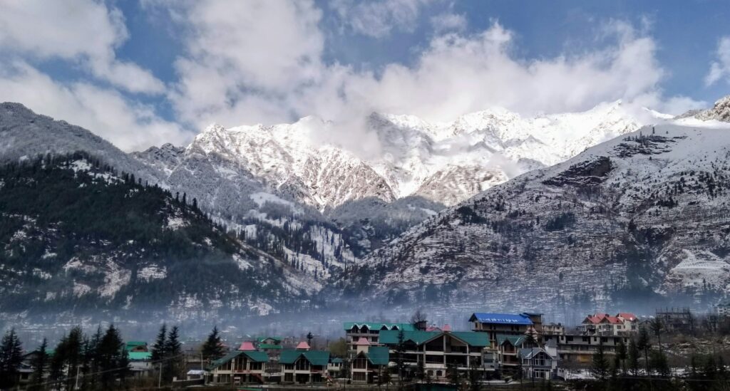 Scenic view of Manali with snow-covered mountains and Beas River valley