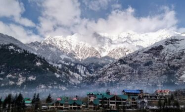 Scenic view of Manali with snow-covered mountains and Beas River valley