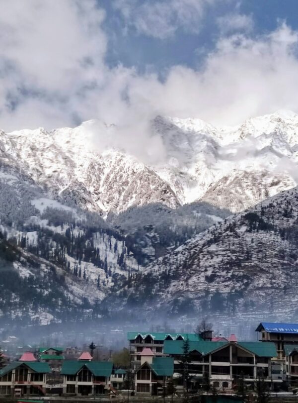 Scenic view of Manali with snow-covered mountains and Beas River valley
