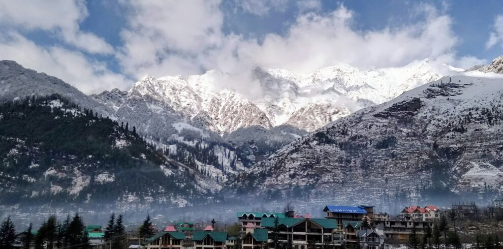 Scenic view of Manali with snow-covered mountains and Beas River valley