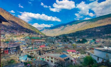 Panoramic view of Kullu city nestled in the Himalayas along the Beas River