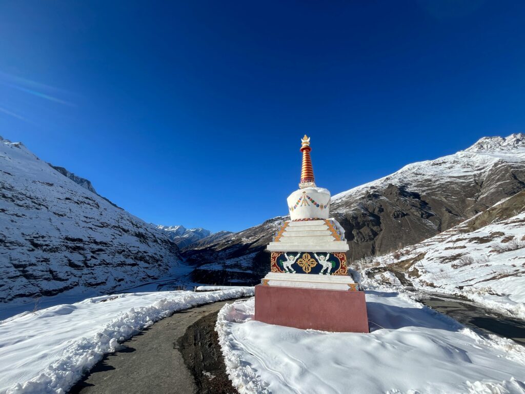 Snow-covered mountains and scenic landscape of Sissu village in Lahaul Valley near Manali
